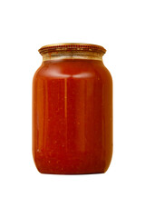 Glass jar with homemade tomato sauce is isolated.