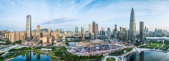 Panoramic of a modern city financial district with skyscrapers and a large construction site in Shenzhen.