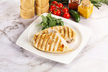 Grilled chicken breast served arugula