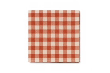 Folded red gingham pattern fabric napkin providing a country style background, transparent png