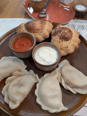 Polish dumplings with dips, fried and baked