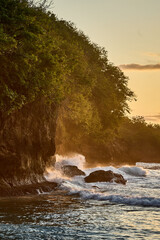 waves crashing on rocks