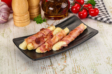 Hot mozzarella sticks with bacon