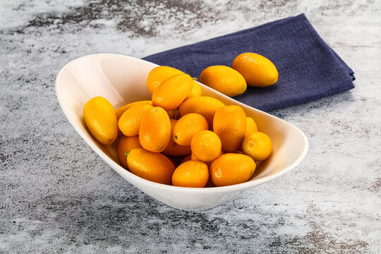 Sweet juicy tropical fruit kumquat - Powered by Adobe