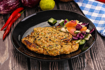 Tasty chicken steak with vegetables