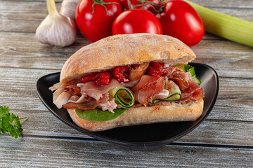 Ciabatta with cured parma and tomato