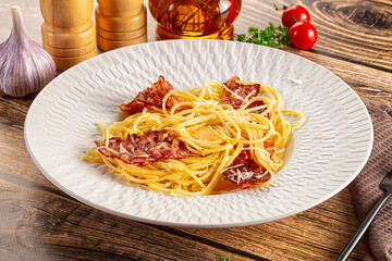 Italian classic spaghetti carbonara with bacon and egg