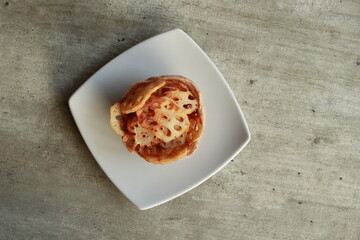 A delicious-looking, perfectly plated dish on a modern plate