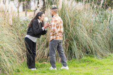 A couple celebrating their love with an unexpected gift in nature