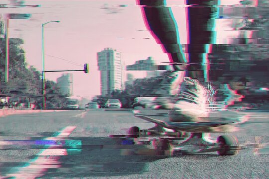 Person riding a skateboard on a city street showing strong visual digital screen glitch effect.