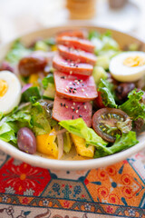 Nicoise style salad with seared tuna and boiled egg