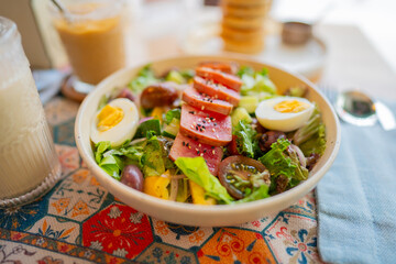 Healthy fresh tuna salad with vegetables on a table