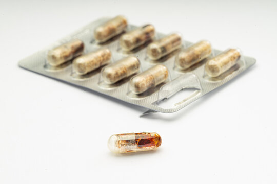 Expired medicine capsules, showing deteriorated and dissolved medicine