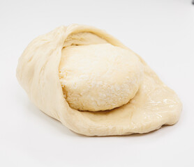 Fresh cheese Ball Resting On Flat Dough Sheet, Georgian Khachapuri Ready for Baking and Cooking