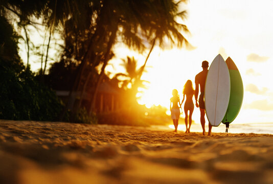 AI. Family with surfboards walking at the beach - Powered by Adobe