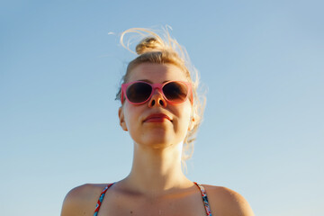 AI. Woman wearing sunglasses against the clear sky