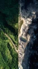 Contrasting Aerial of Green Land Versus Mine Waste
