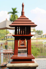 Row of antique wooden lamp on the handrail.