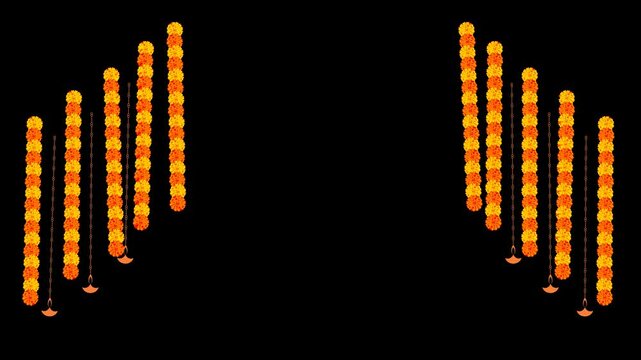 Festive marigold garlands and diyas frame a dark backdrop beautifully