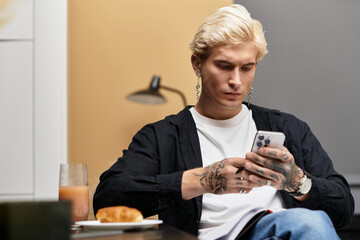 Enjoying a serene morning in the apartment while connecting with friends online