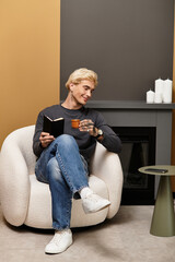 Young handsome man enjoying coffee while relaxing in a cozy apartment with stylish decor