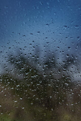 Close up of raindrops on a window on a rainy day