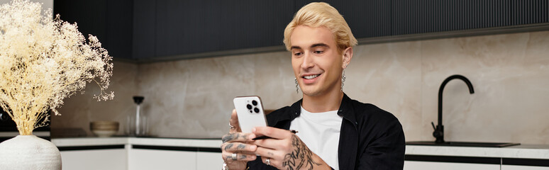 Young man enjoying a moment of bliss while using his smartphone at home