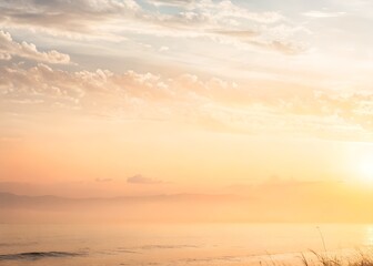 Fototapeta premium Soft pastel sunset over the ocean with gentle waves
