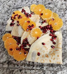 Crapes with pomegranate and oranges 