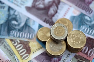Large amount of Hungarian Forint currency money bills and coins. HUF currency banknotes and coins close up