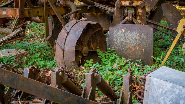 Close-up of weathered red tractor 