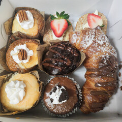 homemade cupcakes, croissant, bakery dessert, box