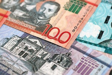 Dominican Republic Pesos currency money bills. DOP currency banknotes in stack with different...