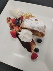 Apple Strudel with vanilla ice cream, gourmet dessert