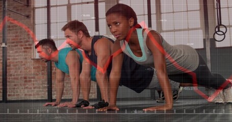 Trio wearing sportswear performing push-ups on mats in brick gym, with boxes rings graph overlay