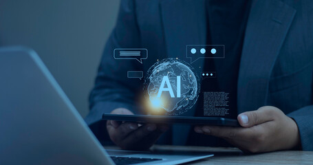 Businessman uses tablet with futuristic AI globe interface. Artificial intelligence connecting global communication network via chatbot technology concept.