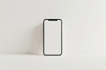 A sleek smartphone with a blank screen on a minimal background