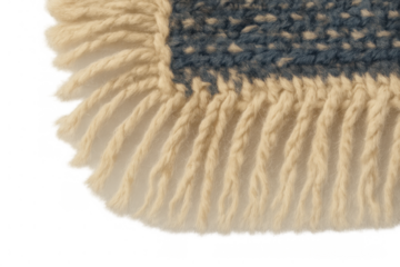 Handmade crochet blanket or scarf fringe in cream and blue wool yarn with transparent background