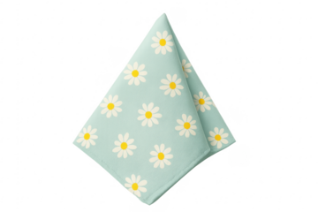 Folded daisy floral pattern textile napkin on transparent background