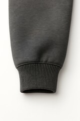Close up of a dark grey ribbed cuff on a garment