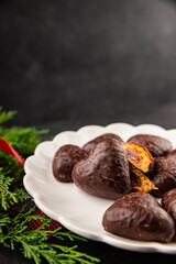 Gingerbread chocolate heart shaped honey cakes Christmas sweet dessert new year natural product tasty snack fresh delicious gourmet food background on the table rustic top view copy space