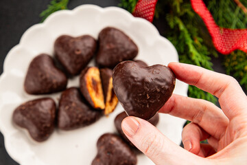 Gingerbread chocolate heart shaped honey cakes Christmas sweet dessert new year natural product tasty snack fresh delicious gourmet food background on the table rustic top view copy space