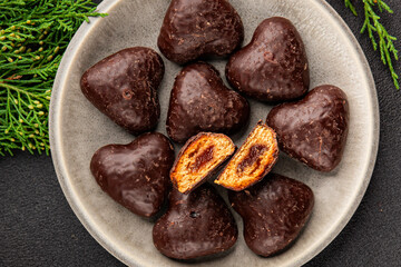 Gingerbread chocolate heart shaped honey cakes Christmas sweet dessert new year natural product tasty snack fresh delicious gourmet food background on the table rustic top view copy space
