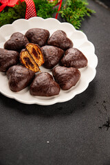 Gingerbread chocolate heart shaped honey cakes Christmas sweet dessert new year natural product tasty snack fresh delicious gourmet food background on the table rustic top view copy space