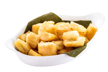 portion of fried cassava in white glass bowl, typical Brazilian food, fried cassava root served hot, white background
