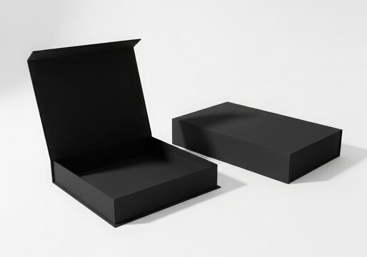 Open black gift box and closed box on white background