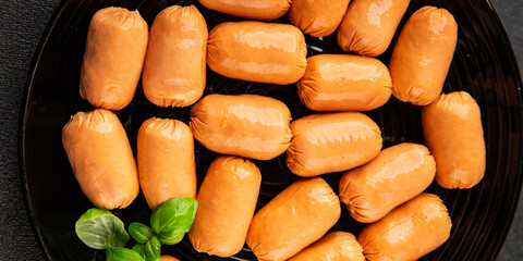 Sausage mini meat portion size fast food natural product tasty snack fresh delicious gourmet food background on table rustic top view copy space