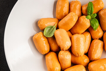 Sausage mini meat portion size fast food natural product tasty snack fresh delicious gourmet food background on table rustic top view copy space