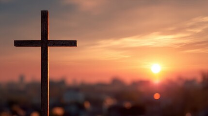 Crucifix against a hazy sunset backdrop Religious theme with space for text