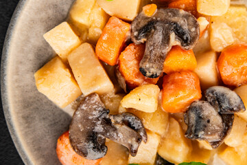 Potato stew mushrooms and vegetables natural tasty snack fresh delicious gourmet food background on the table rustic top view copy space keto and paleo diet vegerian and vegan food